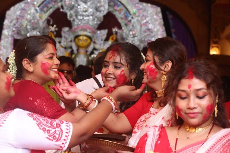 In Images: Sindoor Khela, idol immersion mark Bijoya Dashami in Kolkata