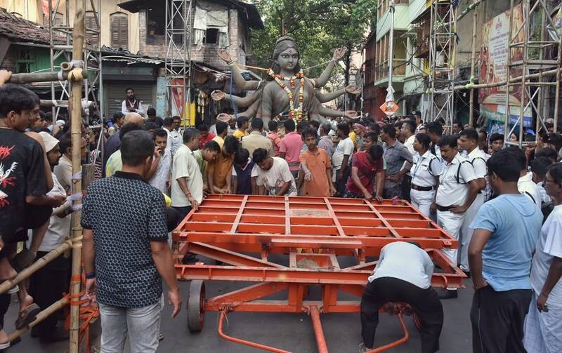 In Images: Chorebagan Durga idol immersed, ‘controversial’ pandal kept intact for SIT probe