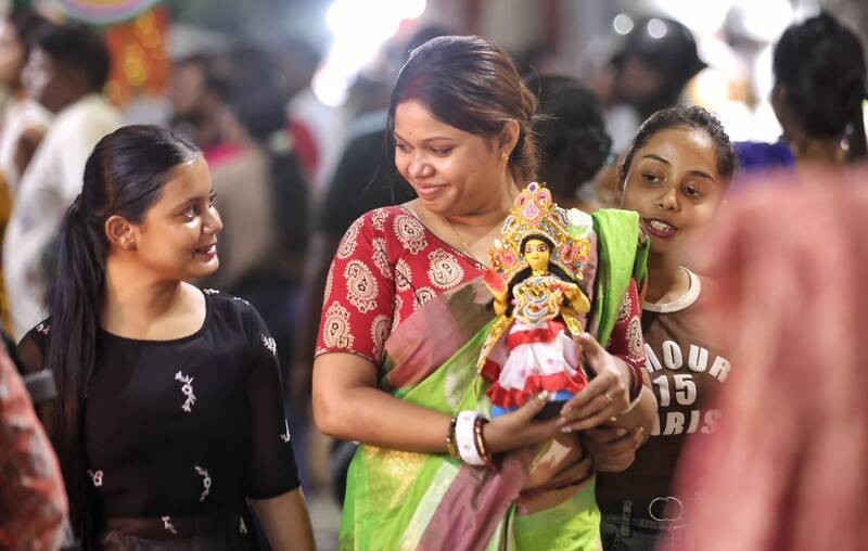 In Images: Kolkata gears up for Lakshmi Puja with idol sales at Kumartuli, alpana decorations at homes