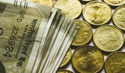 Rupee rises 9 paise, upside limited by dollar demand