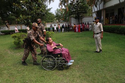 Security steps in as Siliguri votes: Disabled voter assisted in North Bengal polling