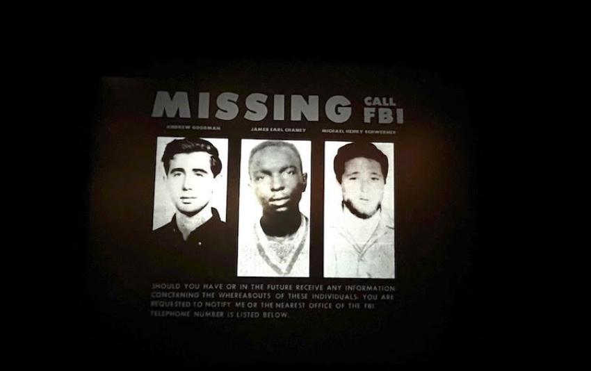 A gallery dedicated to the missing persons poster circulated by the FBI in 1964 showing the photographs of Andrew Goodman, James Chaney, and Michael Schwerner who were abducted and murdered during the Civil Rights Movement.