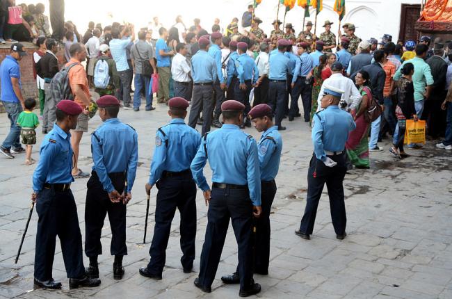 Nepal police use batons on protestors to clear crucial link-bridge