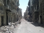 At least 117 dead in suicide bombings in Damascus and Homs
