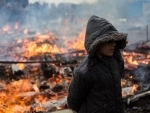 As fires burn through Calais â€˜Jungle,â€™ UNICEF urges protection of children remaining in the camp
