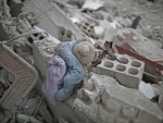 Photo of boy pulled from rubble reminder of 'unimaginable horrors' Syrian children face â€“ UNICEF