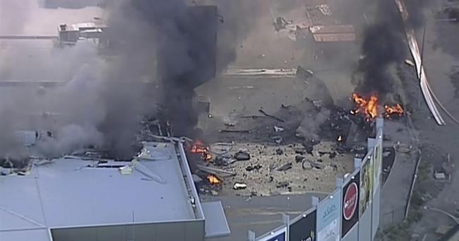 Five feared dead as plane crashes into shopping mall in Melbourne 
