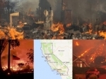 At least 23 people die as northern California firestorm grows