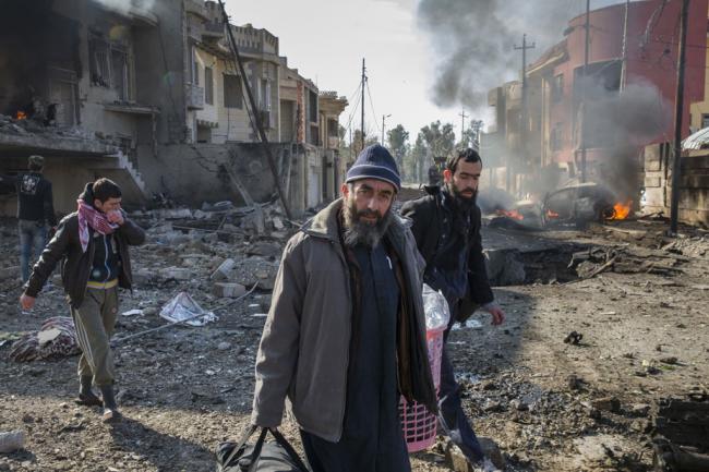 Mosul: UN rights chief urges civilian protection as sniper fire, airstrikes kill dozens