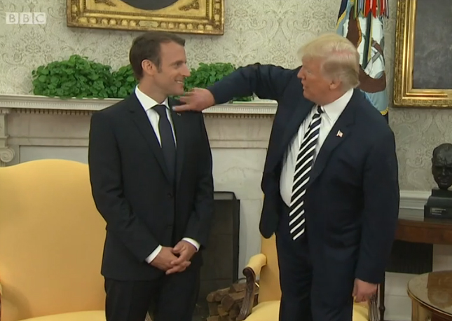 We have to make him perfect: Trump says as he brushes dandruff off Macron's shoulder 
