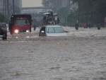 Twelve killed, nearly 15,000 flee home as floods, landslides hit western Indonesia