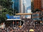 Tens of thousands of protesters March in center of Hong Kong despite police ban