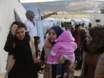As children freeze to death in Syria, aid officials call for major cross-border delivery boost