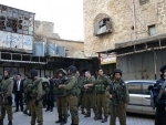 Two Israeli soldiers wounded, 14 Palestinians arrested in West Bank