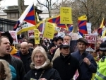 Tibetans demonstrate outside Chinese embassy in Paris against death of young monk Tenzin Nyima