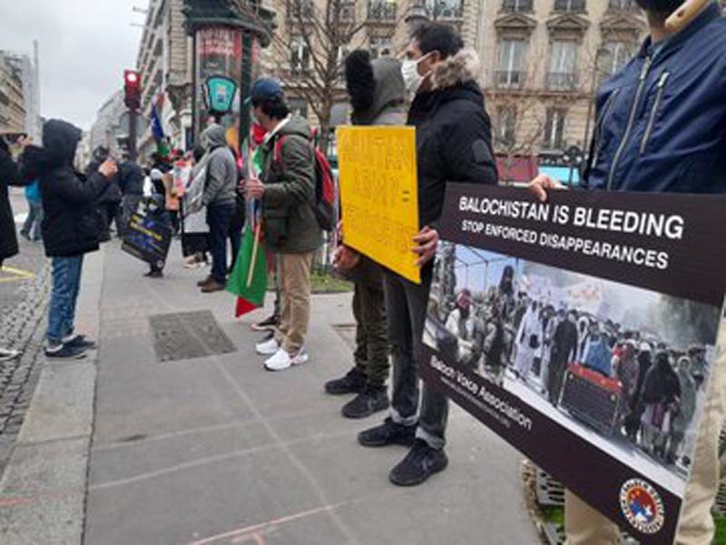 Demonstrators protest outside Canadian Embassy in Paris to demand justice for Karima Baloch