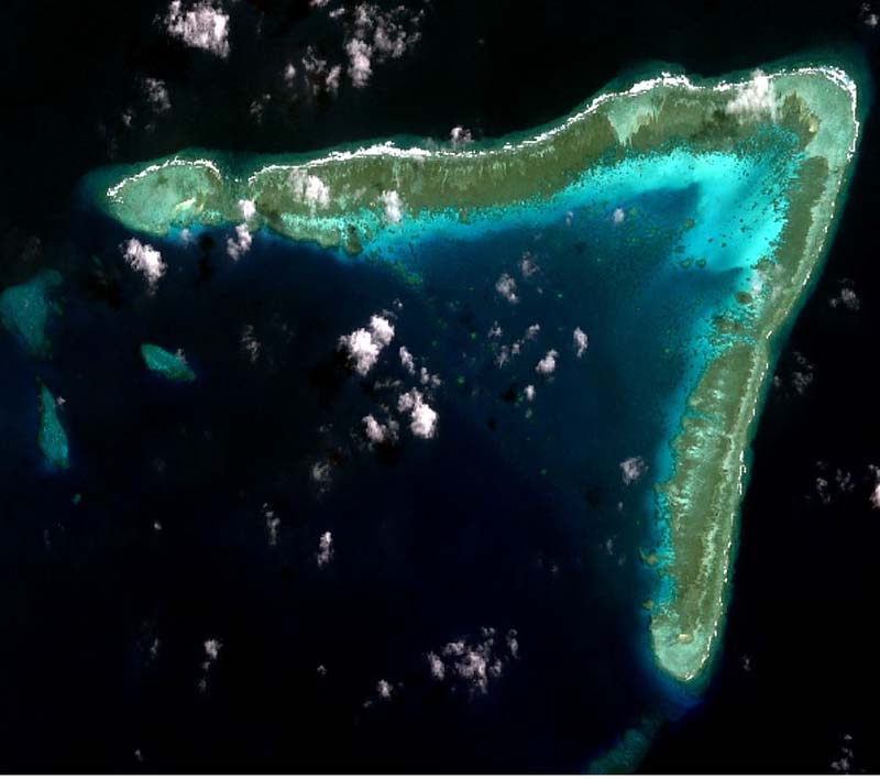 Chinese vessels crowd disputed Whitsun Reef, US backs Philippines