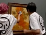 Climate activists throw tomato soup on Van Gogh's 'Sunflower' painting in London