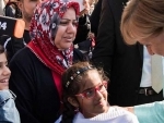 Grandi praises Angela Merkel’s strong ‘moral compass’ as she lands top UNHCR refugee award