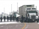 Canada truckers' protest: Alberta Premier calls on protesters to end blockade after collision