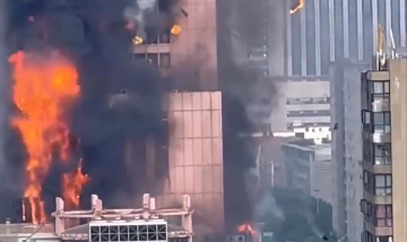 Fire engulfs office tower in China, no casualty