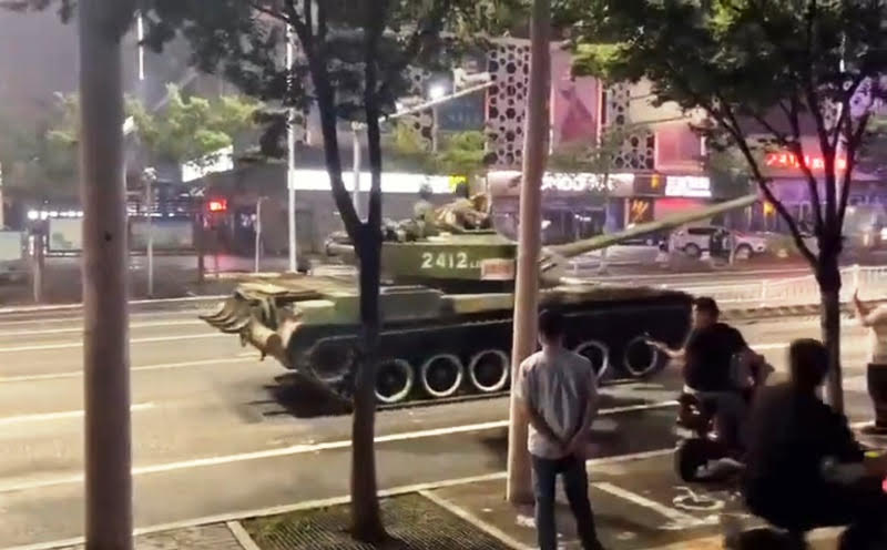 China's financial crisis: Tanks roll on Henan streets to 'protect' banks amid protests