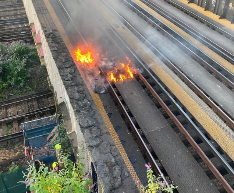 London train tracks burst into flames as UK experiences soaring temperatures