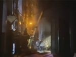 Ten die as fire breaks out in Vietnam building