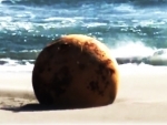 Japan: Authorities remove mysterious metal ball which washed up on beach in Hamamatsu