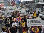 Tibetans protest in Vienna to mark National Uprising Day