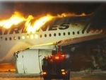 Japan Airlines flight burst into flames after landing at Haneda Airport in Tokyo, all passengers evacuated safely