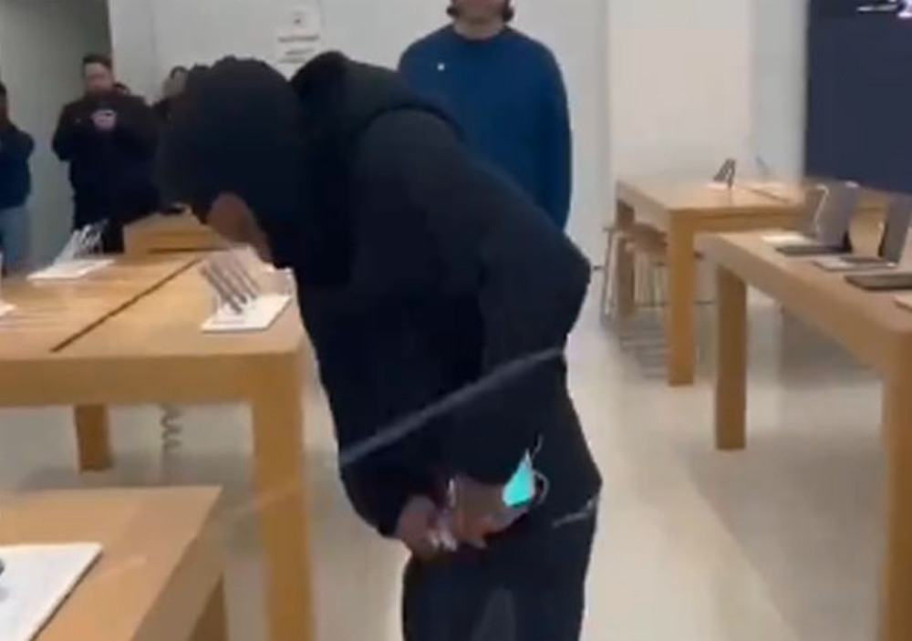 Masked man robs 50 iPhones from California store, video goes viral